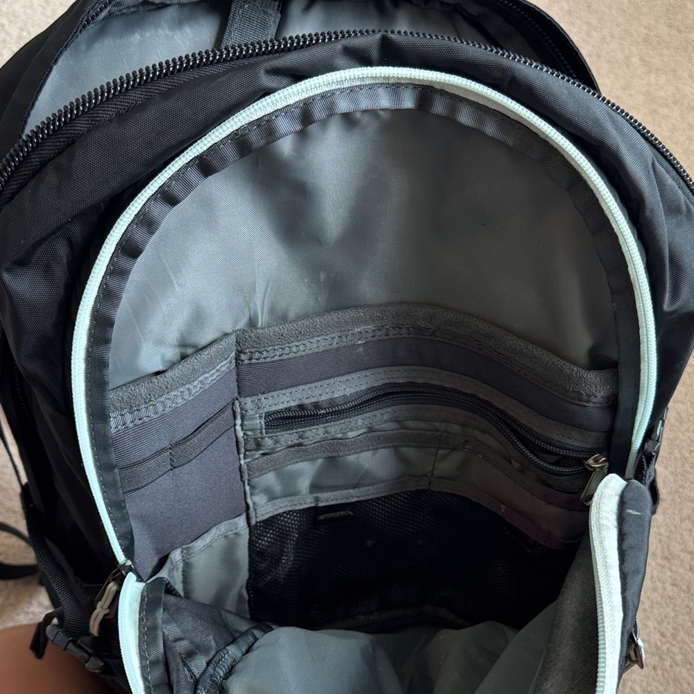 The North Face Black Backpack with White Bungee - Picture 6 of 8